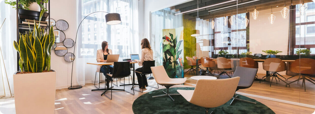 Modern office interior featuring sleek furniture, organized workspaces, and a professional atmosphere for productivity.